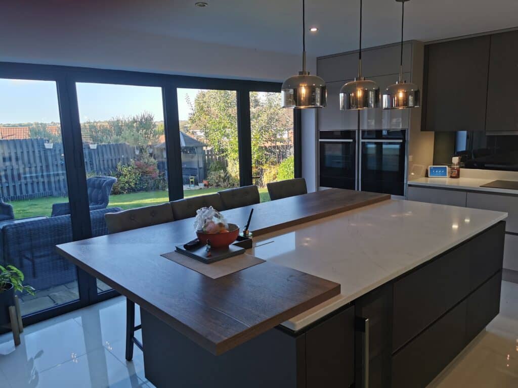 Kitchen Craft Design - Cashmere Glass Handleless Kitchen – L Shaped Kitchen Island